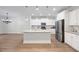 Spacious kitchen featuring a large island, stainless steel appliances, and granite countertops at 2251 W Village Se Ln, Smyrna, GA 30080