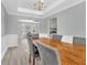 Open dining area showcasing an elegant chandelier and views into the kitchen at 3505 Oakshire Se Way, Atlanta, GA 30354