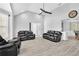 Bright and airy living room featuring modern flooring, neutral paint, and ample seating at 3505 Oakshire Se Way, Atlanta, GA 30354