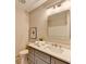 Modern bathroom with updated vanity, large mirror, and neutral color scheme at 591 Paper Ridge Ct, Lawrenceville, GA 30046