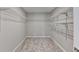 Walk-in closet with carpet floors and wire shelving at 591 Paper Ridge Ct, Lawrenceville, GA 30046