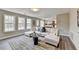 Open-concept living room with views into the kitchen, offering a spacious and airy feel at 591 Paper Ridge Ct, Lawrenceville, GA 30046