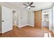Bright bedroom with hardwood floors and sliding barn door at 2081 Verbena Nw St, Atlanta, GA 30314