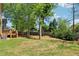 Well-maintained lawn and mature trees enhance the property's outdoor appeal at 2124 Marshalls Se Ln, Atlanta, GA 30316