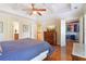 Bedroom with coffered ceilings leading to a walk-in closet and bathroom at 2124 Marshalls Se Ln, Atlanta, GA 30316