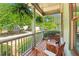 Cozy front porch featuring wooden rocking chairs and hanging plants, perfect for relaxing outdoors at 2124 Marshalls Se Ln, Atlanta, GA 30316