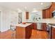 Updated kitchen featuring stainless steel appliances, stone countertops and a center island at 2124 Marshalls Se Ln, Atlanta, GA 30316