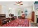 Comfortable living room showcasing hardwood floors, a decorative rug, and ample seating at 2124 Marshalls Se Ln, Atlanta, GA 30316