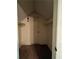 Walk in closet with overhead shelves and additional storage above at 3013 Barcelona Way, Conyers, GA 30012