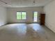 This garage has a large window and door that leads to the backyard at 3013 Barcelona Way, Conyers, GA 30012