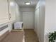Hallway with built-in microwave, storage cabinets and pantry at 3013 Barcelona Way, Conyers, GA 30012