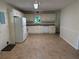 Functional kitchen with essential appliances, including a refrigerator and dishwasher at 3013 Barcelona Way, Conyers, GA 30012