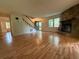 Inviting living room with hardwood floors, fireplace, and staircase at 3013 Barcelona Way, Conyers, GA 30012