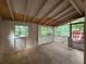 Enclosed porch with a screen door offering scenic views of surrounding greenery at 3013 Barcelona Way, Conyers, GA 30012