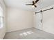 Bedroom features neutral carpet, window with blinds, and white barn door at 2210 Hamstead Ct, Suwanee, GA 30024