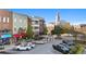 Attractive street view highlighting local businesses and City Hall in the background at 2210 Hamstead Ct, Suwanee, GA 30024