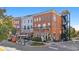 Lively street view showcasing a variety of businesses and outdoor seating areas at 2210 Hamstead Ct, Suwanee, GA 30024