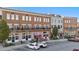 Commercial buildings with a mix of retail and dining options along a bustling street at 2210 Hamstead Ct, Suwanee, GA 30024
