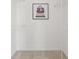 Walk-in closet with carpet, open shelving, and decorated with designer-themed artwork at 2210 Hamstead Ct, Suwanee, GA 30024