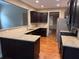 Kitchen featuring granite counters, stainless appliances, and rich cabinets for style and utility at 3622 Foxtrot Nw Trl, Kennesaw, GA 30144