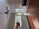 Open concept living room with hardwood floors, fireplace, ceiling fan, and connection to the kitchen at 3622 Foxtrot Nw Trl, Kennesaw, GA 30144