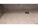 Shower featuring tiled floor and walls with handheld shower head at 3622 Foxtrot Nw Trl, Kennesaw, GA 30144