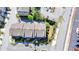 Aerial view of the townhome rooftops with manicured landscaping and parking at 4007 Dunwoody Trce, Atlanta, GA 30338