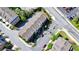Aerial view overlooking roof of townhomes showing nearby streets and landscaping at 4007 Dunwoody Trce, Atlanta, GA 30338