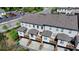 Aerial view of townhome backyards with decks and partial privacy fencing at 4007 Dunwoody Trce, Atlanta, GA 30338