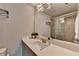 Bathroom with a spacious vanity, a large mirror, and a glass-enclosed shower at 4007 Dunwoody Trce, Atlanta, GA 30338
