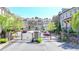 Gated community entrance with landscaped grounds and colorful foliage at 4007 Dunwoody Trce, Atlanta, GA 30338