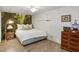 Inviting bedroom with an accent wall, a comfortable bed, and stylish furnishings creating a cozy retreat at 5845 Shannon Dr, Cumming, GA 30040