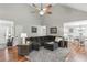 Bright living area with vaulted ceiling, hardwood floors and open layout, great for entertaining and modern living at 5845 Shannon Dr, Cumming, GA 30040