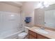 Bathroom featuring a shower over bath, and modern fixtures at 3853 Coralberry Ct, Dacula, GA 30019