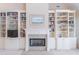 Elegant fireplace with tile surround and built-in bookshelves at 3853 Coralberry Ct, Dacula, GA 30019