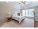 Bright main bedroom with a tray ceiling and large windows at 3853 Coralberry Ct, Dacula, GA 30019