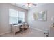 Cozy office space with a large window and a desk at 3853 Coralberry Ct, Dacula, GA 30019