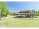 Large picnic pavilion at Little Mulberry Park with picnic tables and charcoal grills at 3853 Coralberry Ct, Dacula, GA 30019
