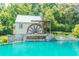 Water feature with a water wheel at Hamilton Mill at 3853 Coralberry Ct, Dacula, GA 30019
