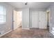 A spacious bedroom provides multiple doorways and a window at 3905 Kirksford Dr, Decatur, GA 30035