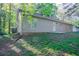 The backyard showcases the house's exterior with a patio at 2800 Macon Se Dr, Atlanta, GA 30354