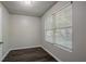 Cozy bedroom featuring new flooring and a large window that offers plenty of natural light at 2800 Macon Se Dr, Atlanta, GA 30354