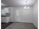 Dining area featuring a new carpet and a door leading to outside at 2800 Macon Se Dr, Atlanta, GA 30354