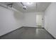 Empty one car garage with lighting and concrete flooring at 2800 Macon Se Dr, Atlanta, GA 30354