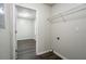 Laundry room that features vinyl flooring, shelving, and washer-dryer hookups at 2800 Macon Se Dr, Atlanta, GA 30354