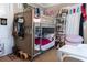 bedroom featuring a bunk bed with shelving and storage at 2800 Memorial Se Dr, Atlanta, GA 30317