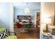 Elegant dining room with hardwood floors, stylish lighting, and modern furniture at 2800 Memorial Se Dr, Atlanta, GA 30317