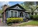 Charming home featuring updated trim and landscaping, with a brick chimney and covered entry at 2800 Memorial Se Dr, Atlanta, GA 30317