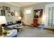 Stylish living room featuring modern decor, unique artwork, and comfortable seating arrangement at 2800 Memorial Se Dr, Atlanta, GA 30317