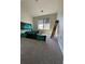 Bright bedroom features neutral walls, carpeted floors, and a window with stylish shades, awaiting personalization at 2964 Olivine Dr, Dacula, GA 30019